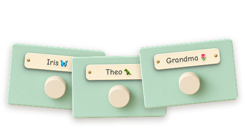 Three desk drawers, each with a nameplate - Iris, Theo, Grandma
