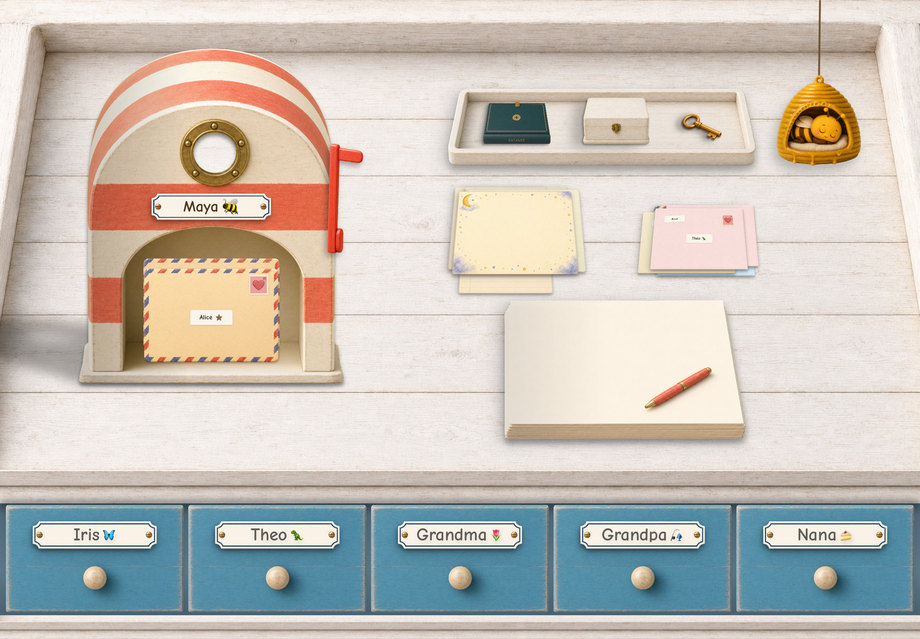 The Seaside Post desk - a red-and-cream striped mailbox with a brass porthole, on whitewashed boards
